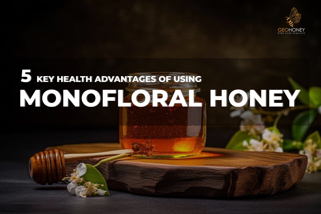 A jar of golden monofloral honey with a spoon, symbolizing the distinct flavor, taste, and health benefits of monofloral honey.